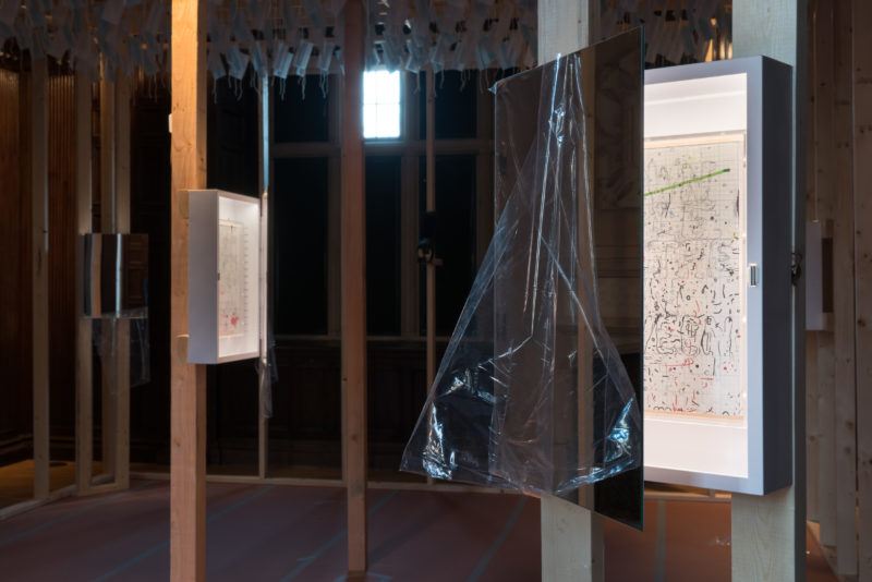 Installation shot of Pope.L's exhibition "My Kingdom for a Title" at Neubauer Collegium for Culture and Society.